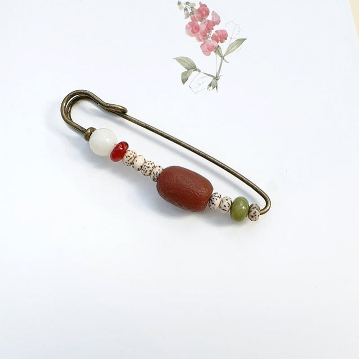 Broche de armonía tranquila con semillas de ágata y Buddha Stones Bodhi