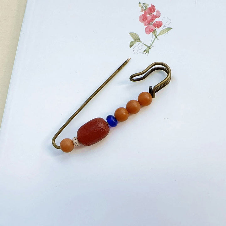 Broche de armonía tranquila con semillas de ágata y Buddha Stones Bodhi