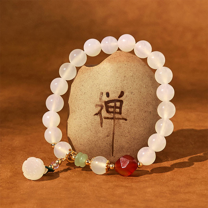 Pulsera con amuleto de la suerte con forma de vaina de loto y ágata blanca y ágata roja de Buddha Stones