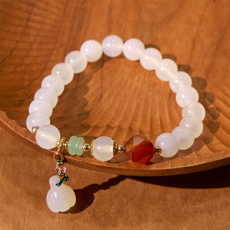 Pulsera con amuleto de la suerte con forma de vaina de loto y ágata blanca y ágata roja de Buddha Stones