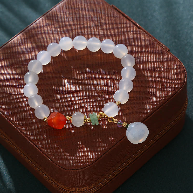 Pulsera con amuleto de la suerte con forma de vaina de loto y ágata blanca y ágata roja de Buddha Stones