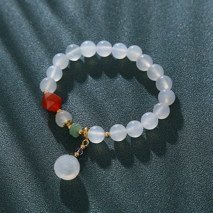 Pulsera con amuleto de la suerte con forma de vaina de loto y ágata blanca y ágata roja de Buddha Stones