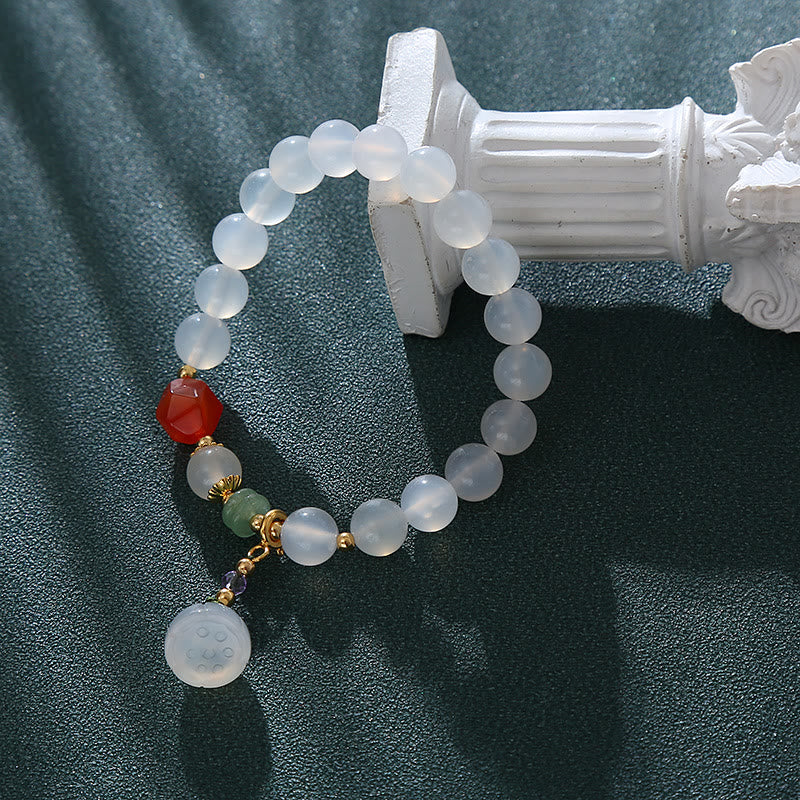 Pulsera con amuleto de la suerte con forma de vaina de loto y ágata blanca y ágata roja de Buddha Stones