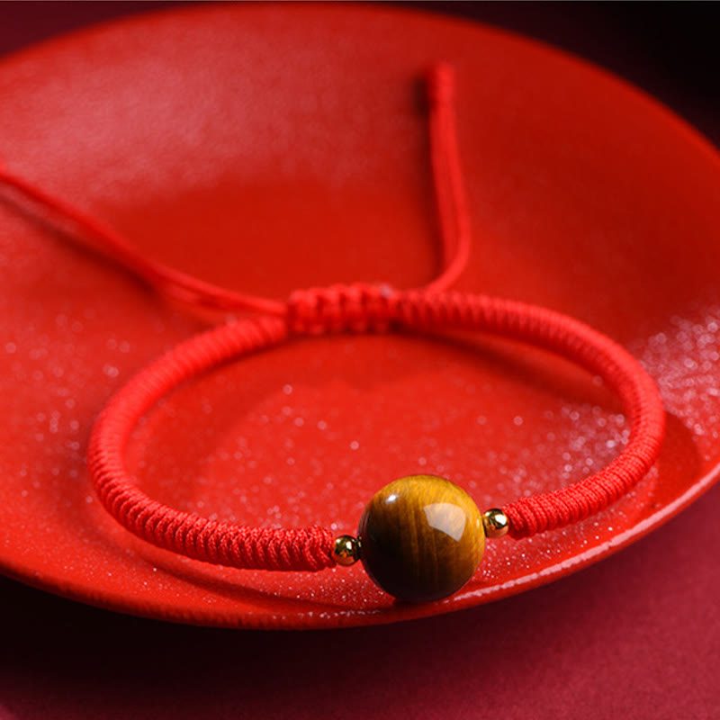 Pulsera de cuerda con cuentas de ojo de tigre y protección de la suerte hecha a mano con Buddha Stones