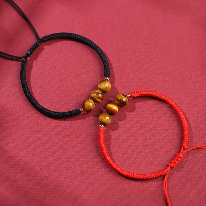 Pulsera de cuerda con cuentas de ojo de tigre y protección de la suerte hecha a mano con Buddha Stones