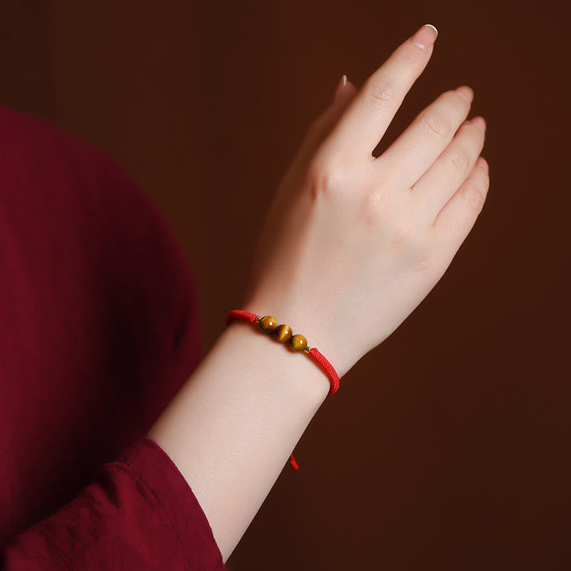 Pulsera de cuerda con cuentas de ojo de tigre y protección de la suerte hecha a mano con Buddha Stones