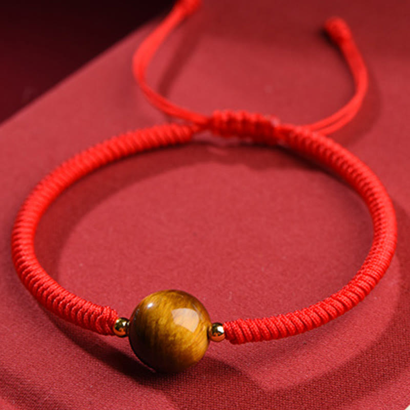 Pulsera de cuerda con cuentas de ojo de tigre y protección de la suerte hecha a mano con Buddha Stones