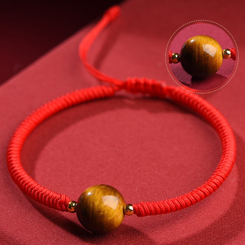 Pulsera de cuerda con cuentas de ojo de tigre y protección de la suerte hecha a mano con Buddha Stones