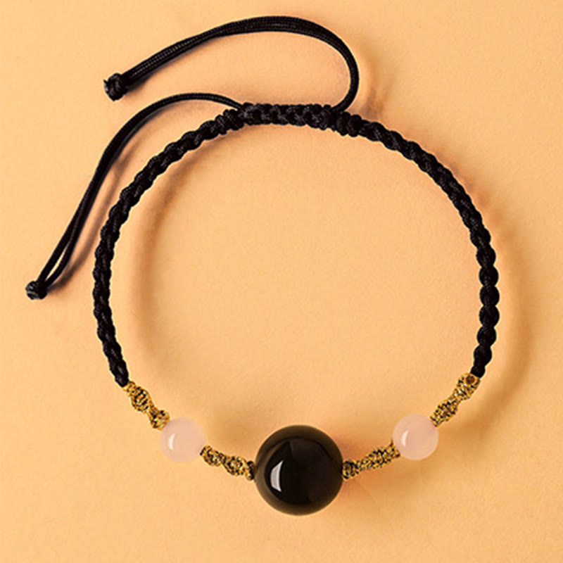 Pulsera trenzada de la suerte con cuentas de ágata roja, ónix negro y jade hetiano de Buddha Stones