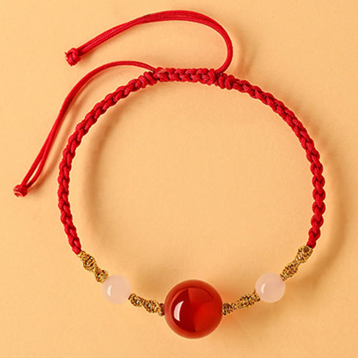 Pulsera trenzada de la suerte con cuentas de ágata roja, ónix negro y jade hetiano de Buddha Stones