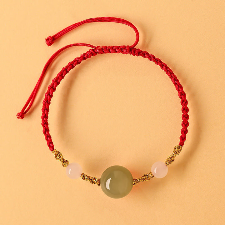 Pulsera trenzada de la suerte con cuentas de ágata roja, ónix negro y jade hetiano de Buddha Stones