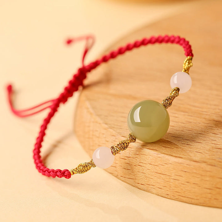 Pulsera trenzada de la suerte con cuentas de ágata roja, ónix negro y jade hetiano de Buddha Stones