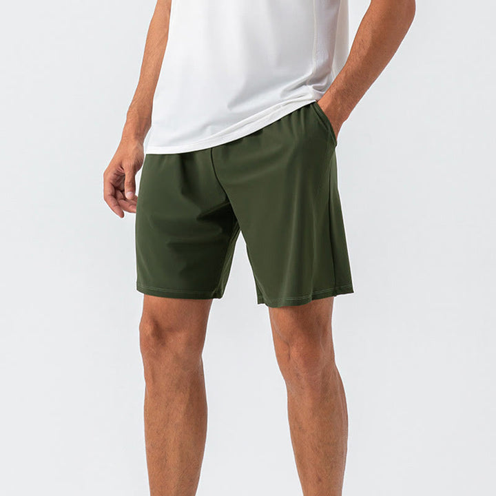 Pantalones cortos deportivos de nailon, sueltos, transpirables y de secado rápido para hombre de Buddha Stones con bolsillos