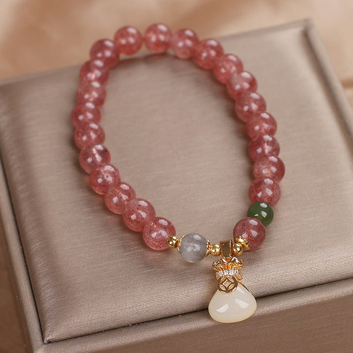 Pulsera positiva con dije de bolsa de dinero de cuarzo fresa natural con Buddha Stones