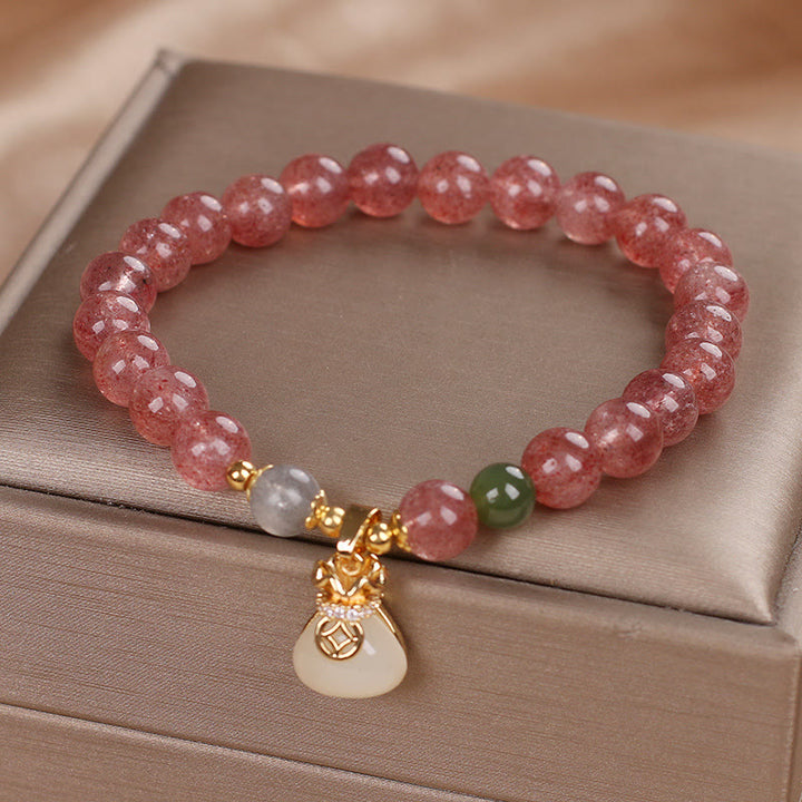 Pulsera positiva con dije de bolsa de dinero de cuarzo fresa natural con Buddha Stones