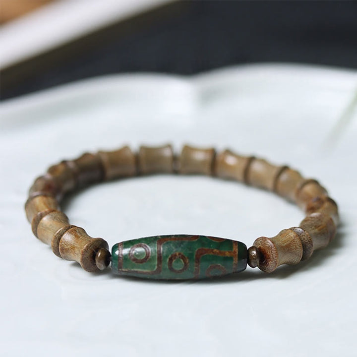 Pulsera de la paz de sándalo verde con cuentas Dzi tibetanas de nueve ojos y Buddha Stones