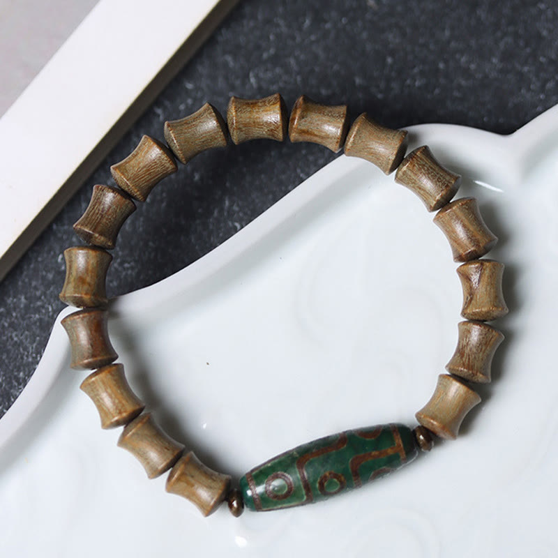 Pulsera de la paz de sándalo verde con cuentas Dzi tibetanas de nueve ojos y Buddha Stones