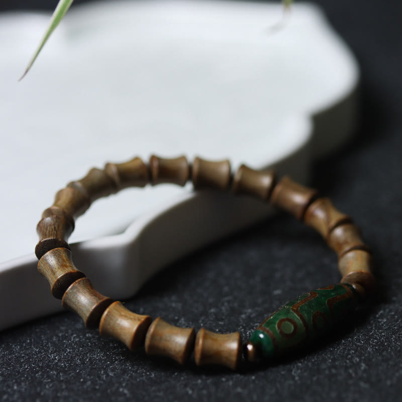 Pulsera de la paz de sándalo verde con cuentas Dzi tibetanas de nueve ojos y Buddha Stones
