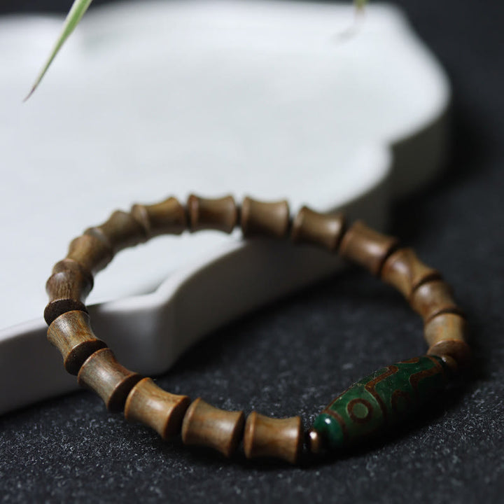 Pulsera de la paz de sándalo verde con cuentas Dzi tibetanas de nueve ojos y Buddha Stones