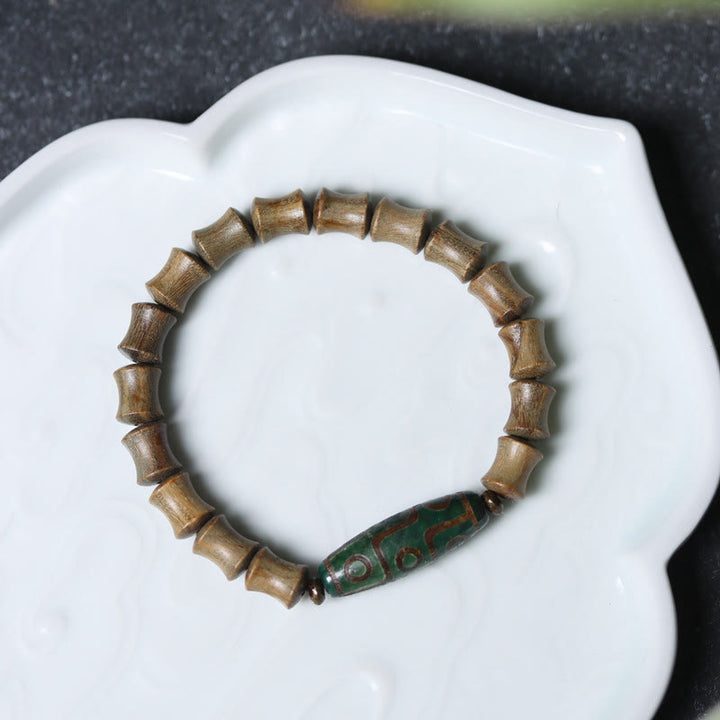 Pulsera de la paz de sándalo verde con cuentas Dzi tibetanas de nueve ojos y Buddha Stones