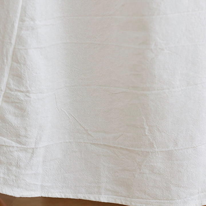 Vestido midi informal de lino y algodón con cuello en V y mangas tres cuartos con estampado floral bordado de Buddha Stones - image 7