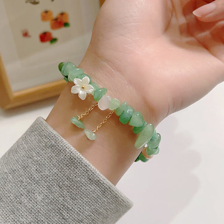 Pulsera curativa con flores de cristal Super Seven y cuarzo fresa natural y cuarzo fresa verde de Buddha Stones