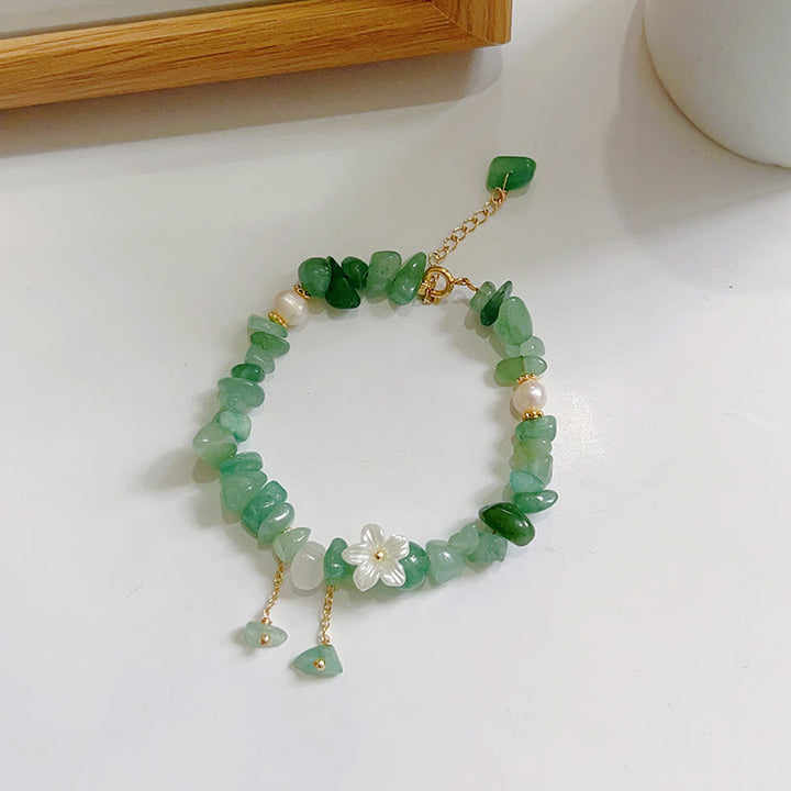 Pulsera curativa con flores de cristal Super Seven y cuarzo fresa natural y cuarzo fresa verde de Buddha Stones