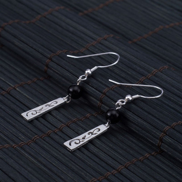 Pendientes colgantes de protección con forma de enredadera hueca de ónix negro y Buddha Stones en plata de ley 925