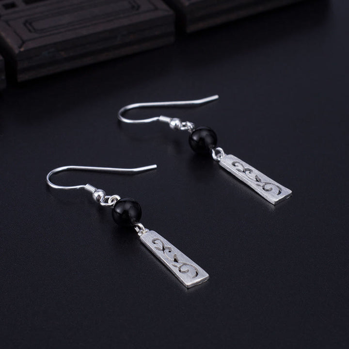Pendientes colgantes de protección con Buddha Stones en plata de ley 925 y ónix negro con forma de enredadera hueca - image 1