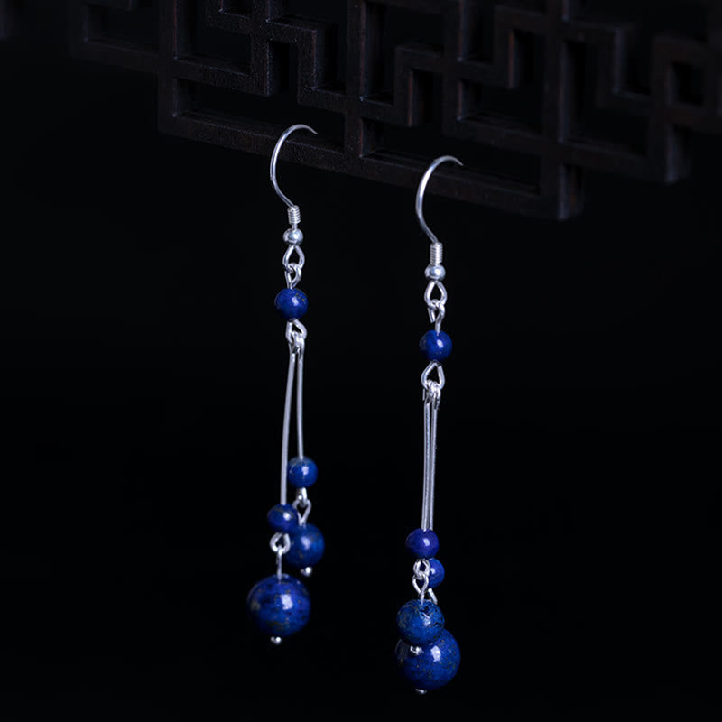 Pendientes colgantes Serenity con cuentas de lazurita y Buddha Stones en plata de ley 925