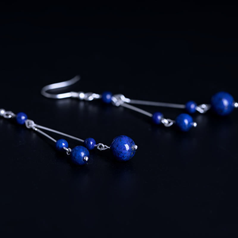 Pendientes colgantes Serenity con cuentas de lazurita y Buddha Stones en plata de ley 925