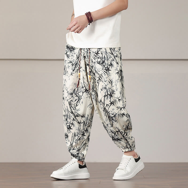 Pantalones harén con cordón y bolsillos para hombre con estampado de hojas de bambú y Buddha Stones - image 1