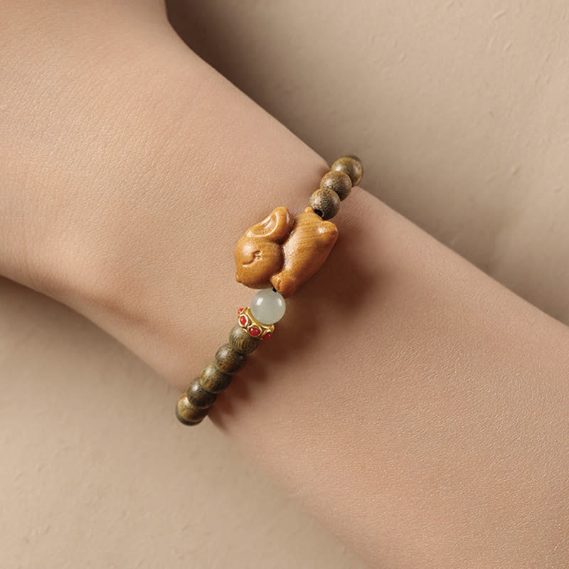 Pulsera positiva con forma de conejo y sándalo verde y dorado con Buddha Stones