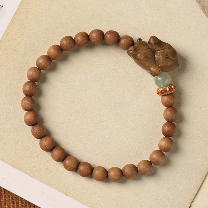 Pulsera positiva con forma de conejo y sándalo verde y dorado con Buddha Stones