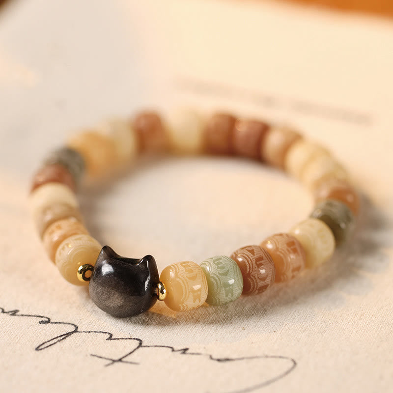 Pulsera de sabiduría con cabeza de gato de obsidiana tallada en plata con Buddha Stones, semillas de Bodhi y Om Mani Padme Hum - Semilla de Bodhi amarilla de 8 x 10 mm (circunferencia de la muñeca: 14-16 cm) - image 1