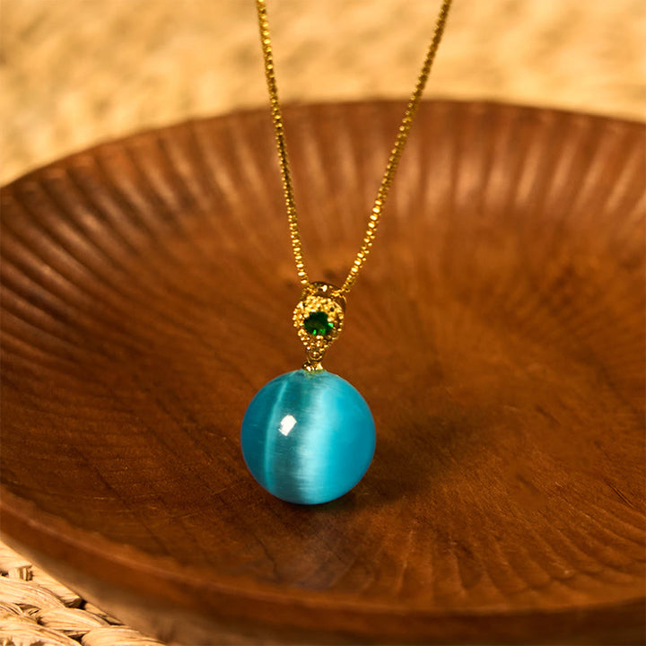Buddha Stones Colgante de collar con forma de bola redonda de ojo de gato que inspira confianza - Ojo de gato azul - image 0