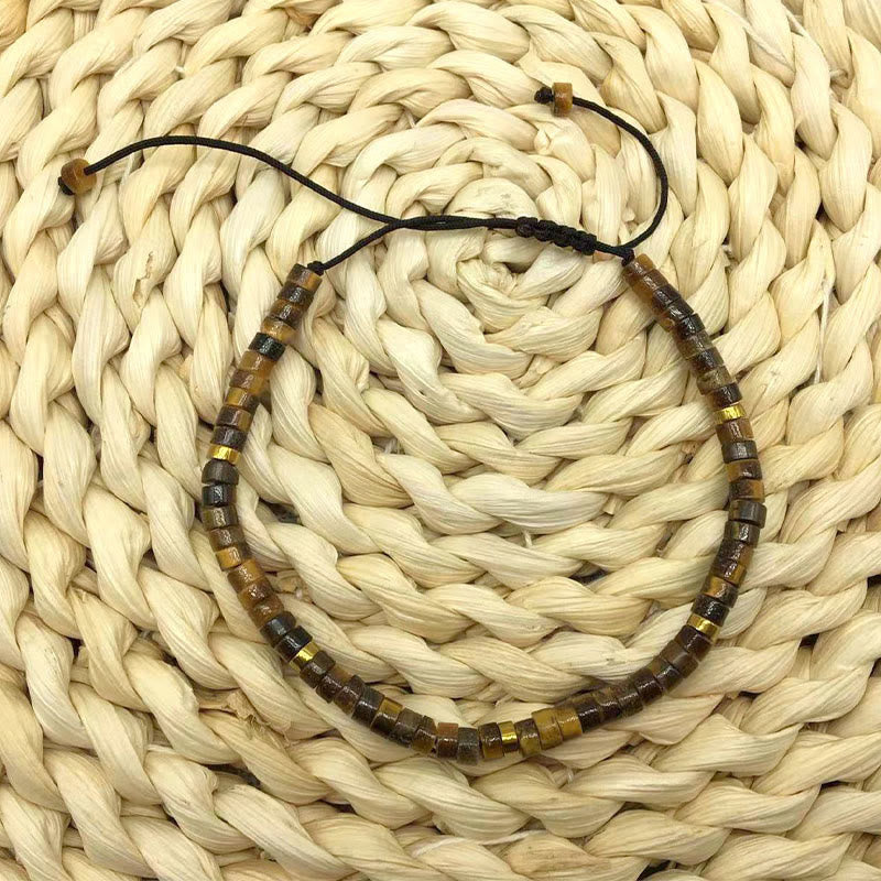 Pulsera de coraje con cuentas espaciadoras de ojo de tigre natural de Buddha Stones