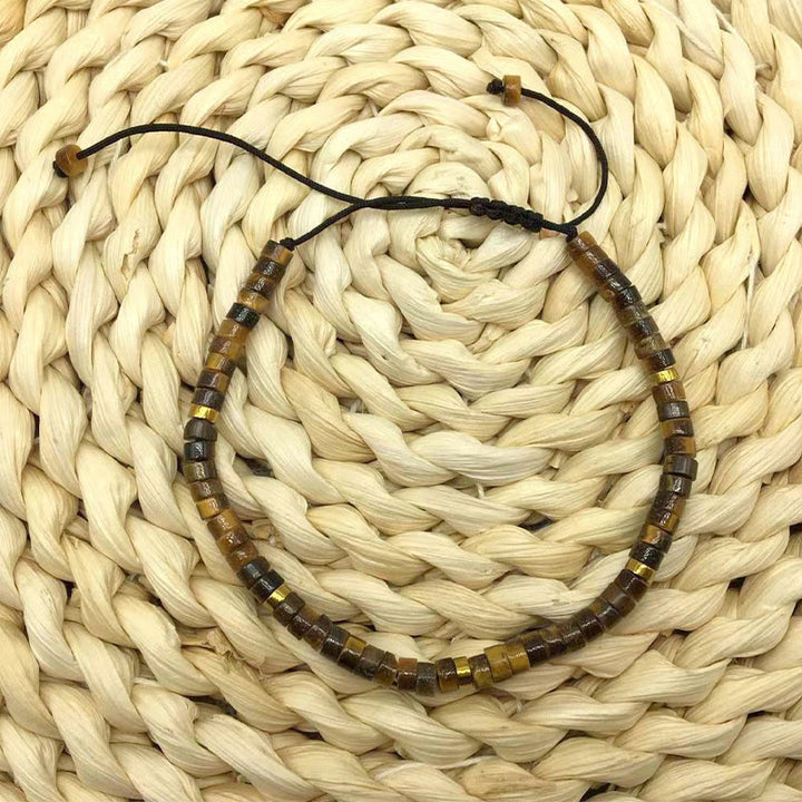 Pulsera de coraje con cuentas espaciadoras de ojo de tigre natural de Buddha Stones