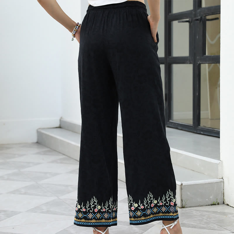 Buddha Stones Pantalones de lino y algodón con bordado floral de primavera en color negro para mujer, con cordón y bolsillos. - image 1
