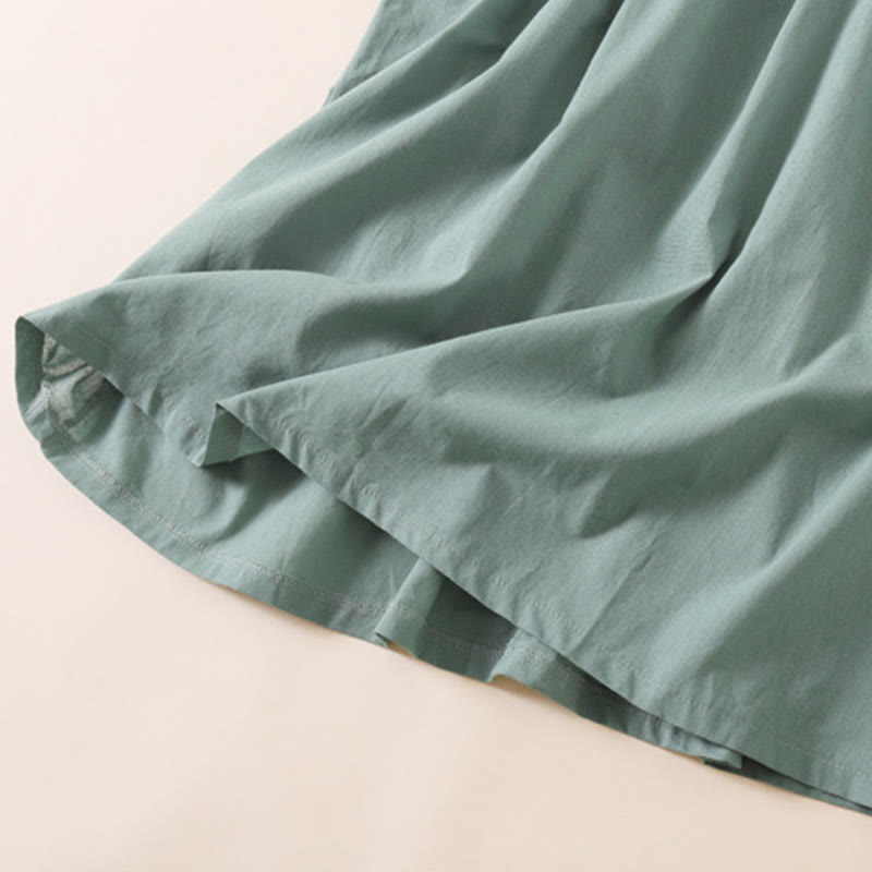 Vestido midi de manga corta con bolsillos, diseño de botones y estampado de Buddha Stones para el verano. - image 26