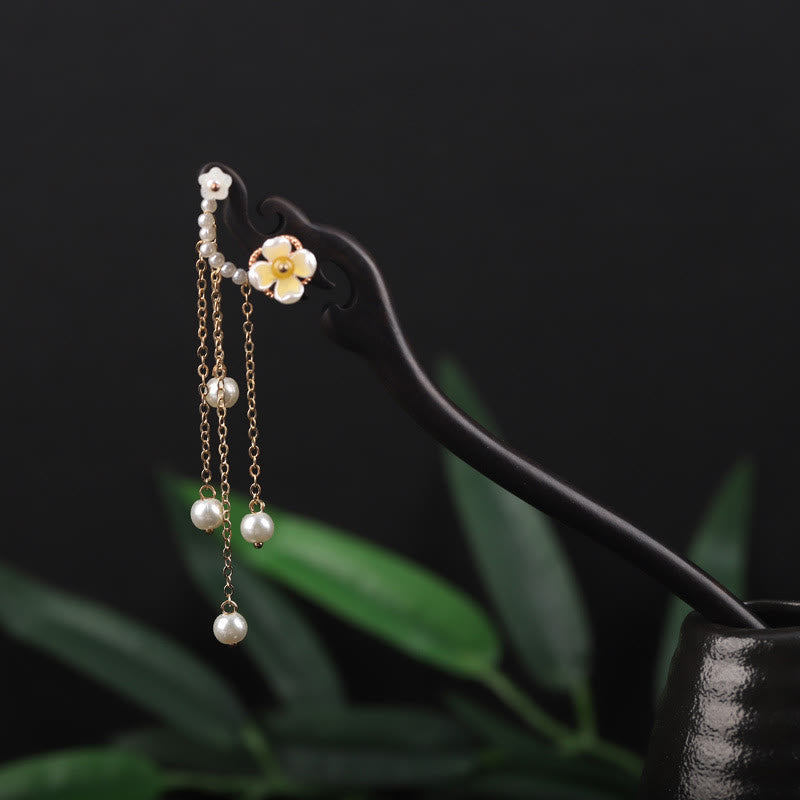 Horquilla con borla de perla, flor de concha de ébano y Buddha Stones