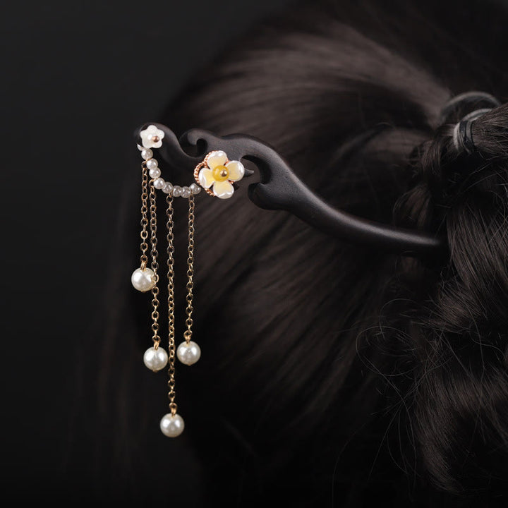 Horquilla con borla de perla, flor de concha de ébano y Buddha Stones