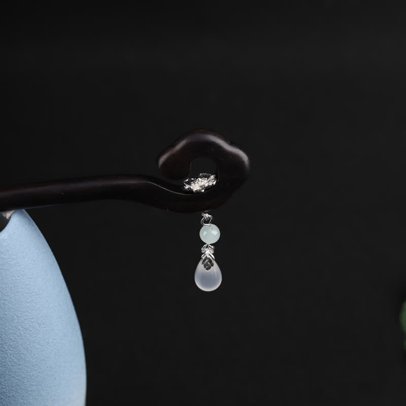Horquilla de coraje de nube auspiciosa de ébano con Buddha Stones
