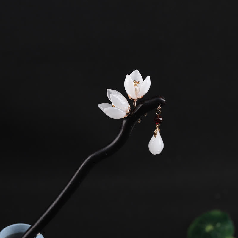Horquilla con bendición de pétalos de flor de magnolia y ébano con Buddha Stones