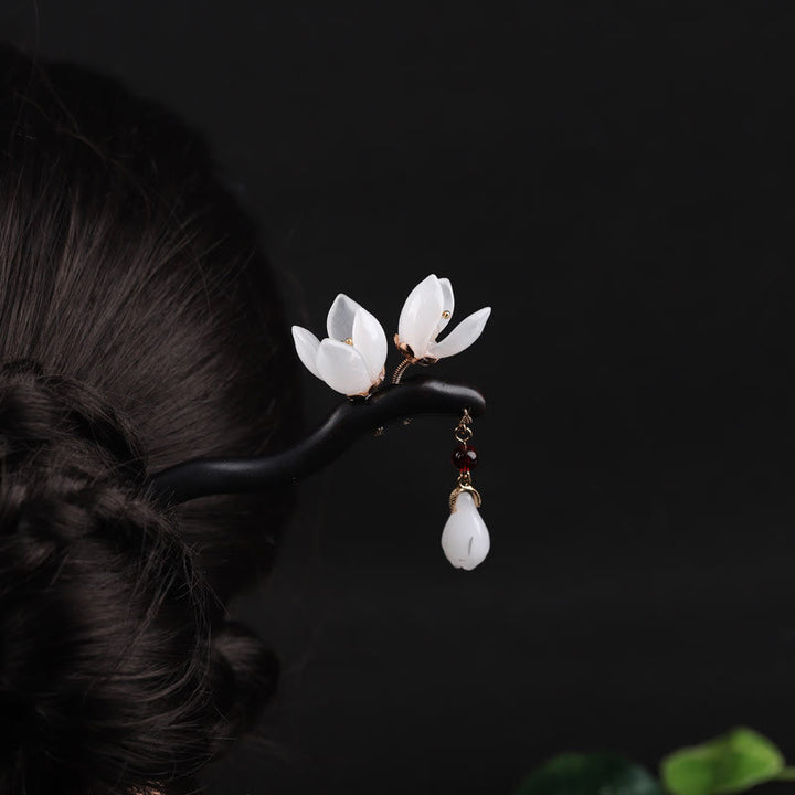 Horquilla con bendición de pétalos de flor de magnolia y ébano con Buddha Stones