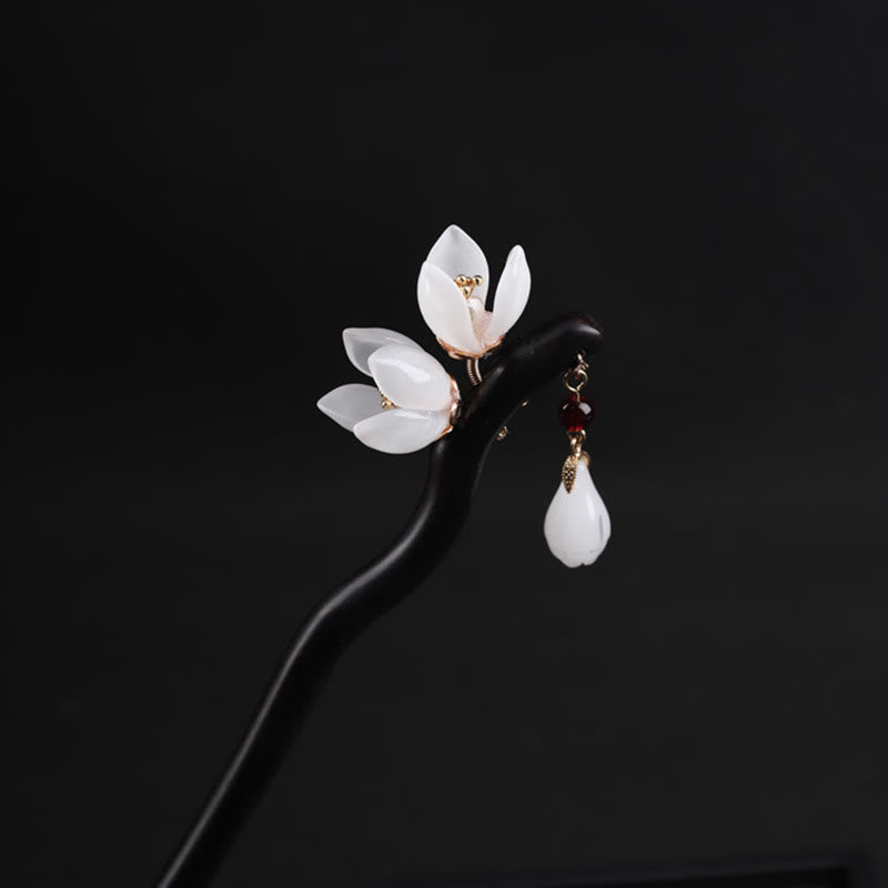 Horquilla con bendición de pétalos de flor de magnolia y ébano con Buddha Stones