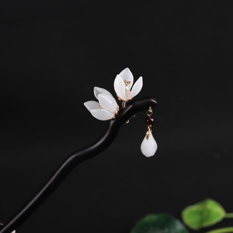 Horquilla con bendición de pétalos de flor de magnolia y ébano con Buddha Stones