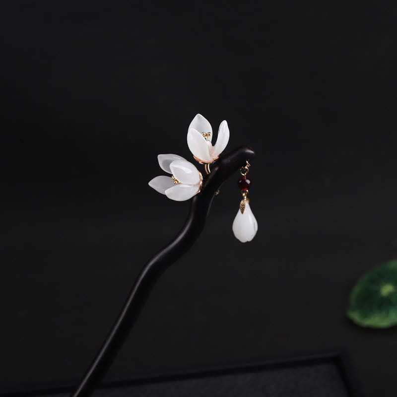 Horquilla con bendición de pétalos de flor de magnolia y ébano con Buddha Stones