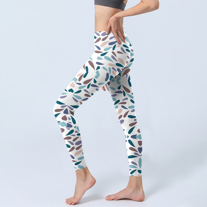 Leggings de yoga para mujer con estampado de bloques multicolor y Buddha Stones en blanco - image 3