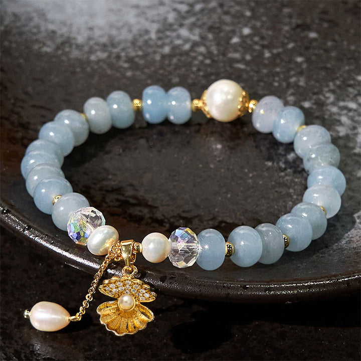 Pulsera de cuentas curativas de concha de perla y aguamarina natural de Buddha Stones